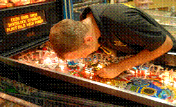 Repairing a competition machine at the UK Pinball Show